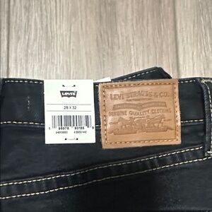 Levi's Dark Denim with Tan Patch